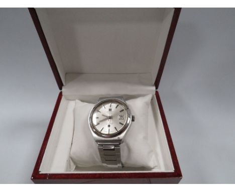 A BOXED TISSOT AUTOMATIC CSTAR WATCH 