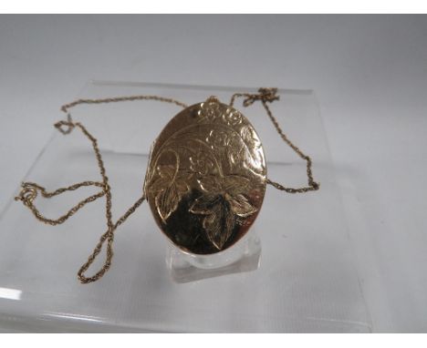 A VINTAGE LOCKET MARKED ROLLED GOLD