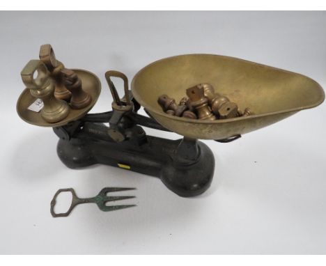 A SET OF VINTAGE SCALES WITH ASSORTED WEIGHTS 
