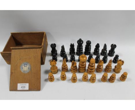 A VINTAGE TURNED WOODEN CHESS SET 