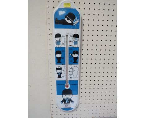 A VINTAGE PLASTIC THERMOMETER FOR THE HOMEPRIDE FLOWER COMPANY