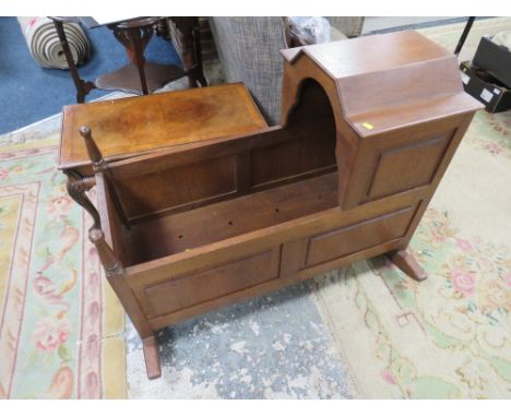 A LARGE OAK VINTAGE CHILDS CRADLE