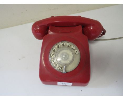 A VINTAGE RED TELEPHONE WITH MODERN CABLE A/F 