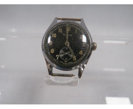 A VINTAGE MILITARY WRISTWATCH BY HELVETIA