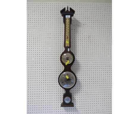 A MODERN COMBINATION BAROMETER/CLOCK THERMOMETER