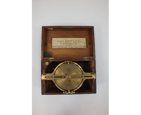 A mahogany cased brass surveyor's compass with silvered five inch dial marked, Davis and Son, Derby No. 225 with two bubble l