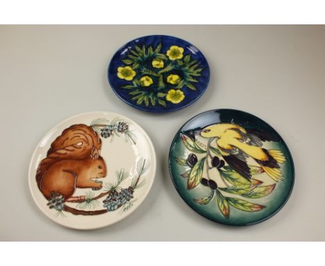 Three Moorcroft limited edition year plates; including 1990, 1990, designed by Sally Tuffin, no. 73/250, 22cm diameter; 2003,