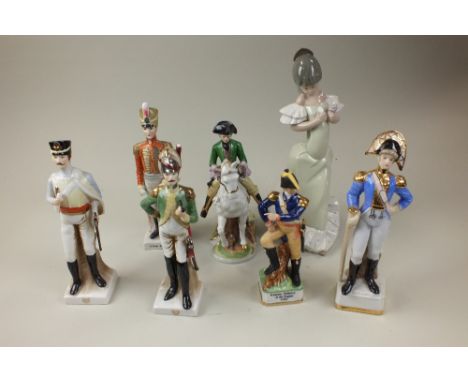 A collection of fifteen Continental porcelain figures of soldiers, four Coalport figures of ladies and one Nao figure of a Sp