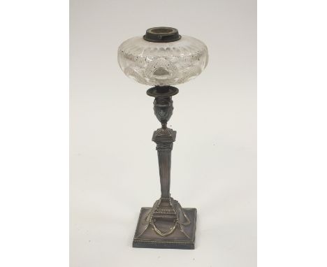 A Walker and Hall electro-plated Adam revival style table candle stick converted to a paraffin lamp with cut clear glass rese