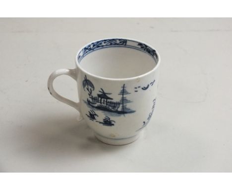 A Lowestoft porcelain coffee cup painted with a Chinese River Scene within a lattice and floral border, unmarked, circa 1770,