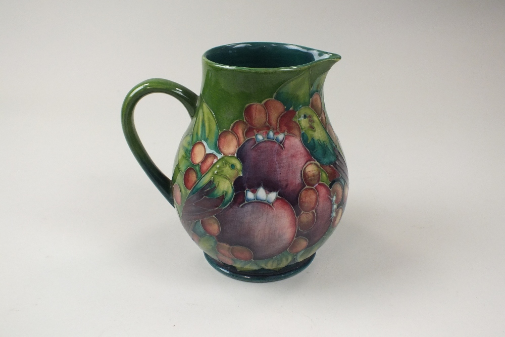 A contemporary Moorcroft jug decorated Green Finches amongst Fruit