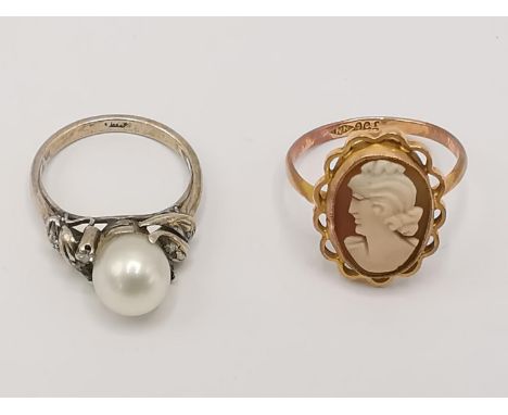 A 9ct gold and a 14ct white gold ring, one set with a pearl, the other a cameo 6.6g Location: Cab 