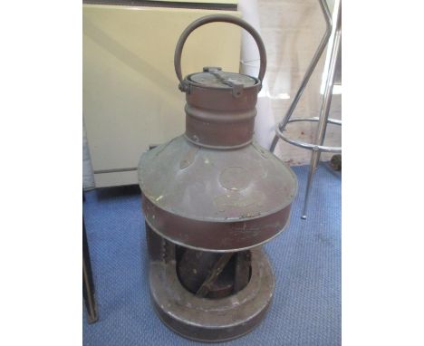 An early 20th century copper ships light with label reading Richard Irvin &amp; Sons, 64h 