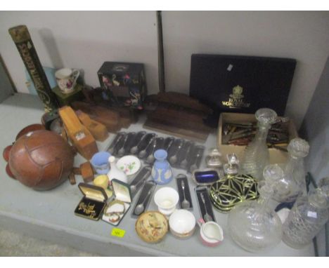 A mixed lot to include a vintage leather football, boxed shuttlecocks, woodworking planes, Royal Worcester cutlery, decanters