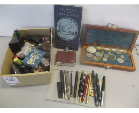 A mixed lot to include pens, coins, hip flask, standard folding map and miniatures 