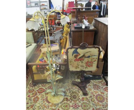 Regency rosewood and brass pole screen with tapestry panel, and a painted metal floral standard lamp 
