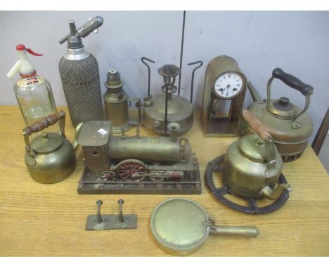 A mixed lot of mainly metalware to include a model of a train, late 19th century clock movement housed in a later case, brass