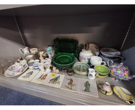 Mixed vintage china to include Wade and Cabbage ware, five tiles depicting Charles Dickens characters, egg cups and an enamel