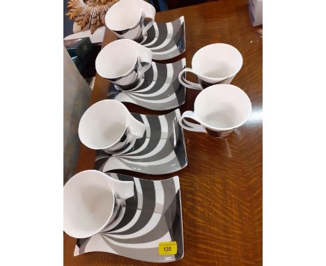 Six Villeroy &amp; Boch Marc Manu cups and four matching wave saucers circa 2006, all signed Location: Back Row 
