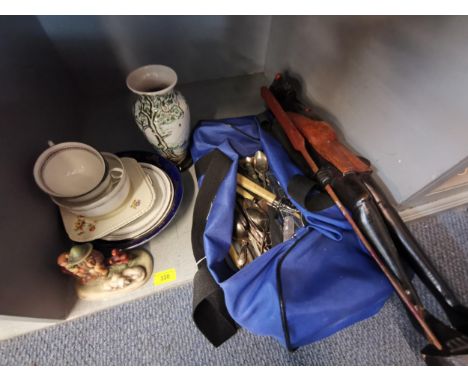Mixed cutlery and flatware to include silver plate, a tribal figure, and mixed ceramics Location: LWB 
