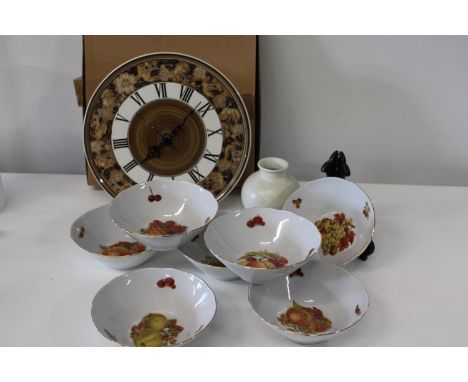 A collectable Jersey pottery wall clock &amp; CP German Desert dishes &amp; Poole pottery vase 