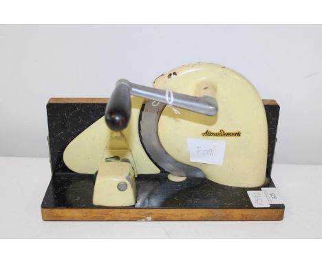 A vintage mid century meat slicer 