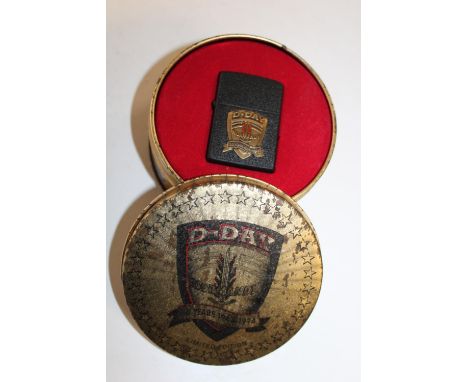 A boxed unused limited edition D-Day commemorative lighter. 