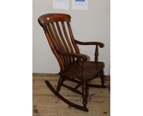 A vintage elm rocking chair collection only 
