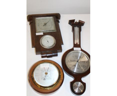 Three vintage wooden cased barometers 