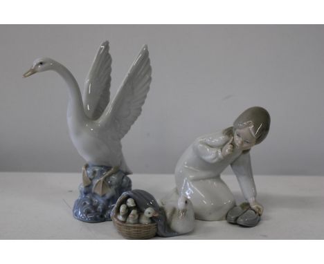 Two Lladro and a Nao figure largest 20cm tall 