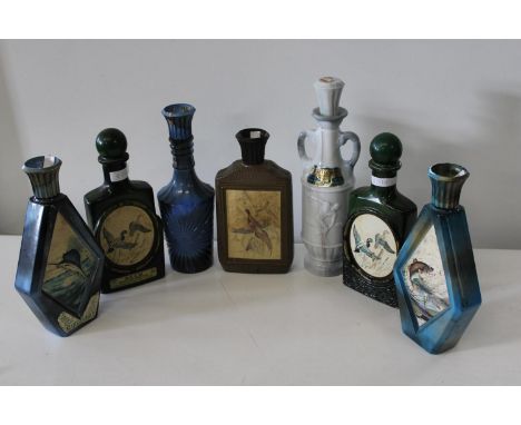 A job lot of vintage ceramic liquor bottles 