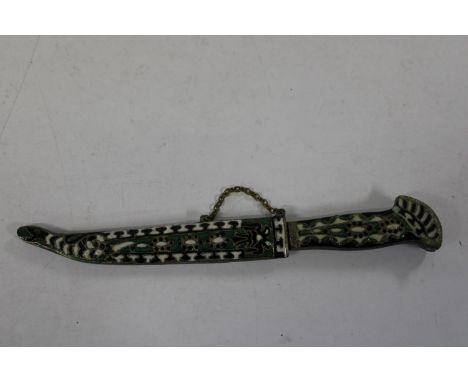 A unusual enamelled Indian style dagger 