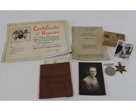 A selection of WW2 militaria awarded to a Harold Mitcham army No 272590 