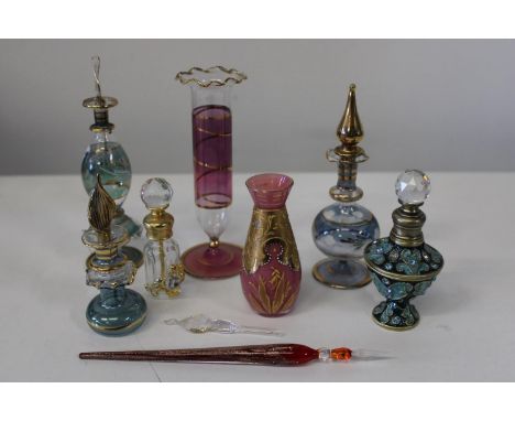 A selection of vintage coloured glass perfume bottles etc 