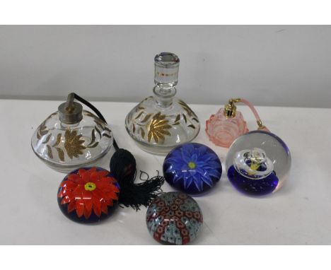 A selection of paperweights and vintage bottles etc 