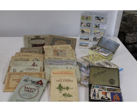 A selection of assorted vintage cigarette cards 