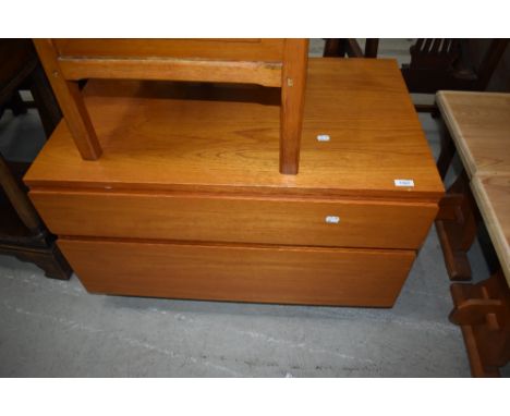 A vintage teak low chest of two drawers
