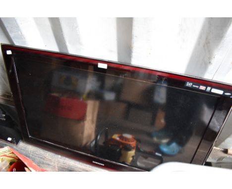 A Samsung TV, and stand (stand not currently attached)
&nbsp;
Stand looks complete , no guarantees , model number shown on ad
