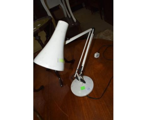 A vintage angle poise lamp in the Herbert Terry style