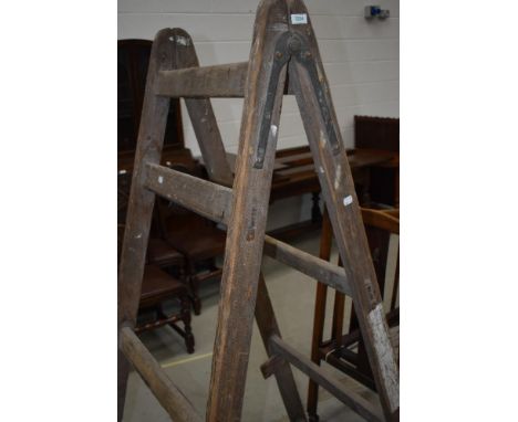 A vintage decorators wooden ladder/trestle platform