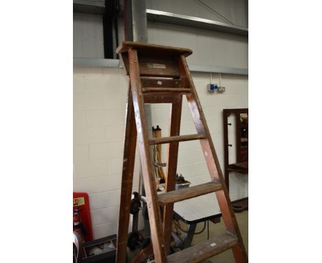 A traditional set of wooden step ladders, decorators or similar, large 8 rung design