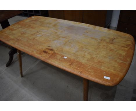 A vintage Ercol style kitchen dining table (af)
Top having lost its varnish