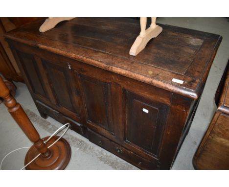 A 19th Century oak kist of four panel design