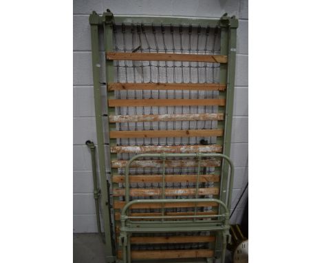 Two vintage metal single bed frames, possibly hospital or prison related
94cm wide