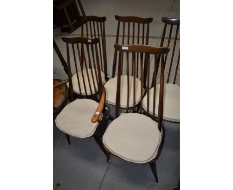 A set of five (four plus one) 1960s wave and spindle back kitchen chairs, stamped 2056, 1966 probably Ercol, having mid/dark 