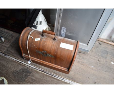 A vintage Singer sewing machine in case