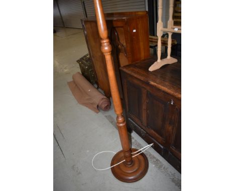 A traditional stained frame standard lamp