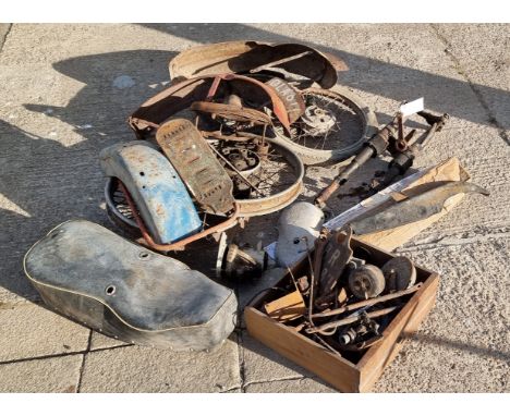 An autojumblers lot to include a c.1968 Triumph Tiger Cub front forks, chain guard and engine cases, two Ariel Red Hunter mud