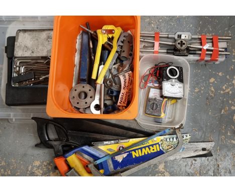 A collection of various tools, including motorcycle specific. 
