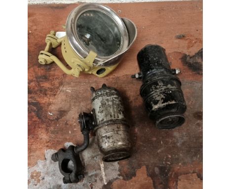 A Lucas 331 carbide acetylene lamp and two carbide holders (3).